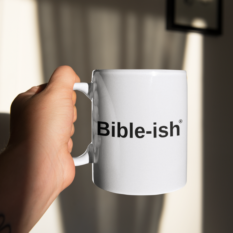 Mockup-Of-Man-Holding-A-15oz-Tall-Mug