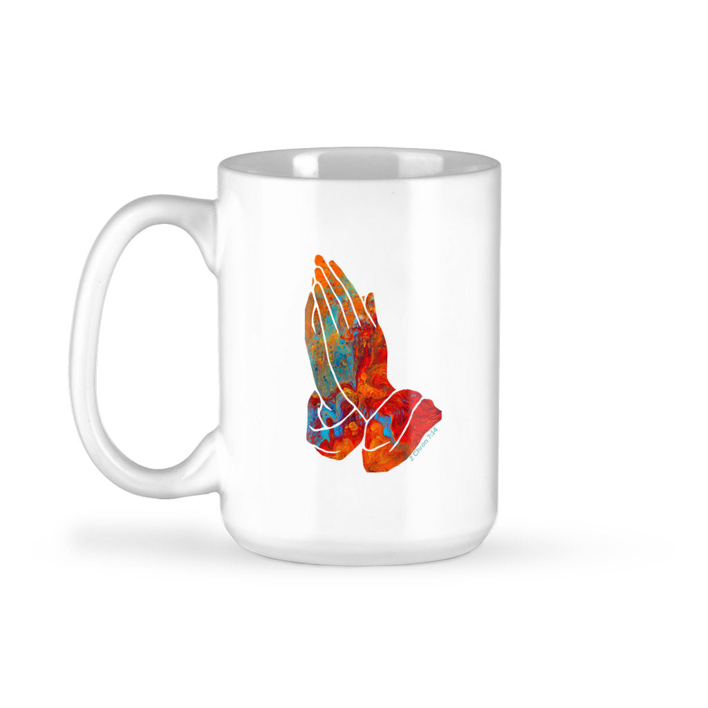 Multi-colored praying hands on a 15 oz cup